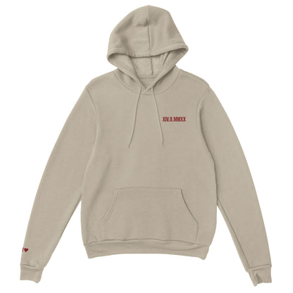 Sweat à capuche avec date romaine brodée